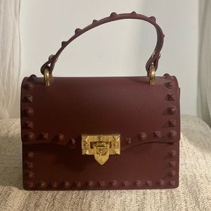 Burgundy handbag